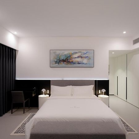 One Riviera Hotel And Residences Ban Souanmone Екстериор снимка